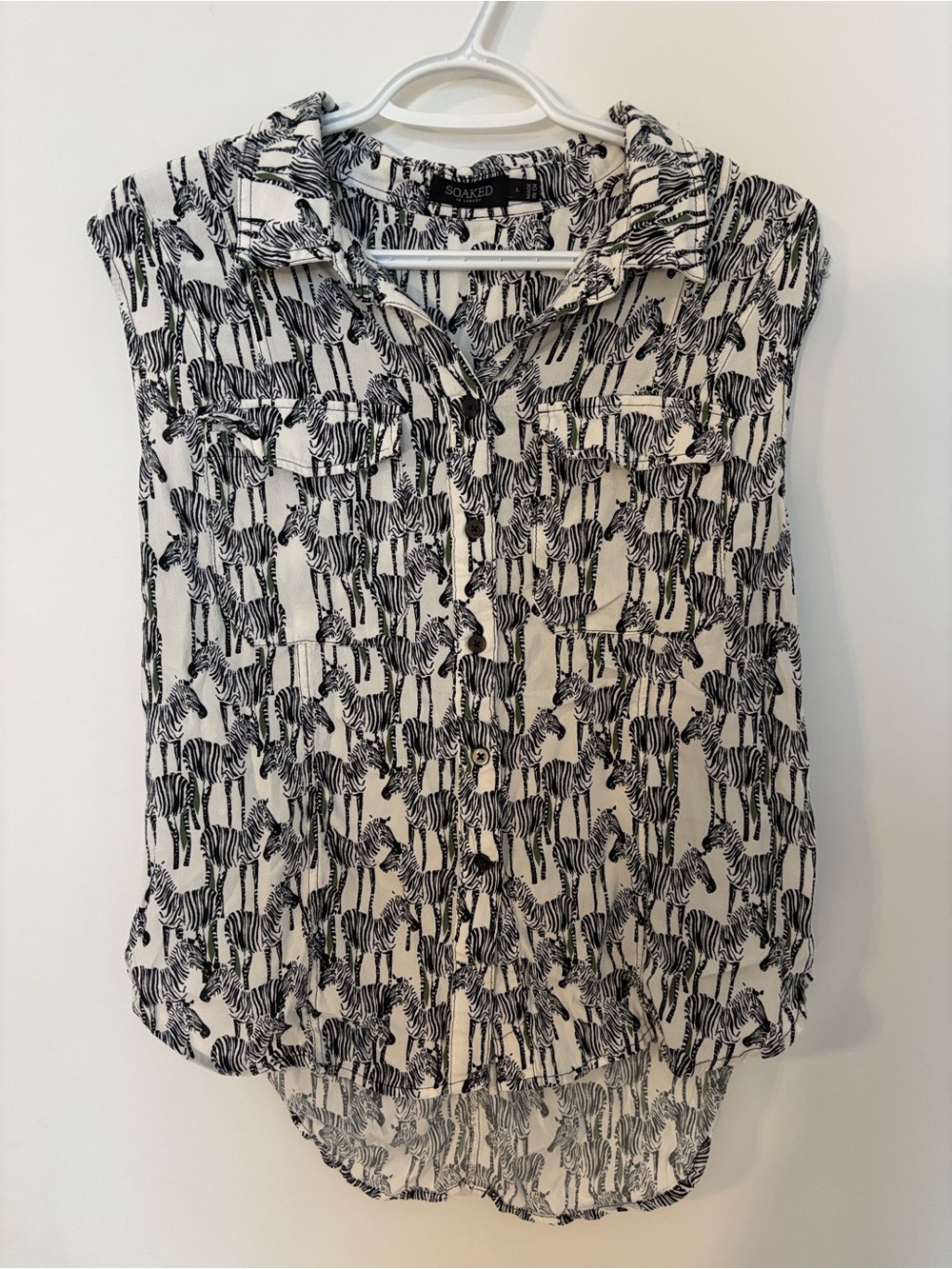 Soaked in Luxury Black & White Zebra Print Sleeveless Button-Down Shirt